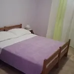 Angela *